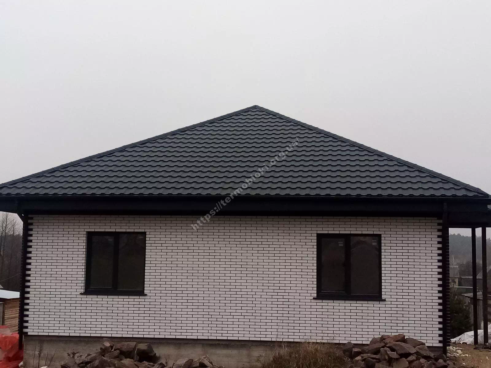Rovenskaya region. Sarny. Ceramic granite thermal panel Termodom. Brickstyle white and strand brown 5